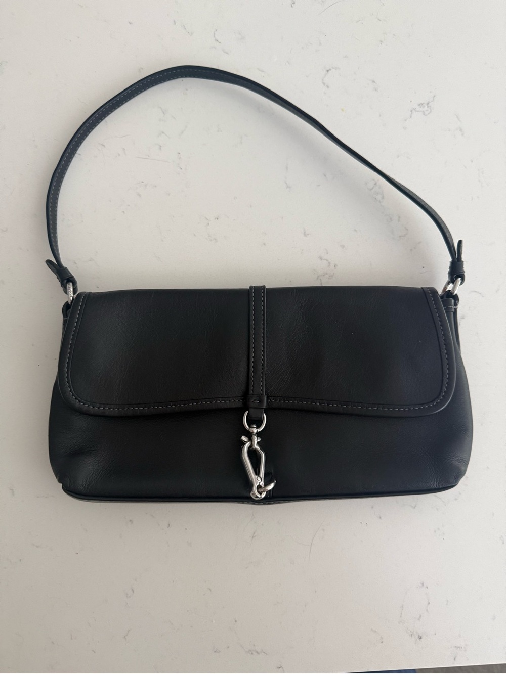 Coach Hampton’s Black Leather Shoulder Bag with Silver Clasp